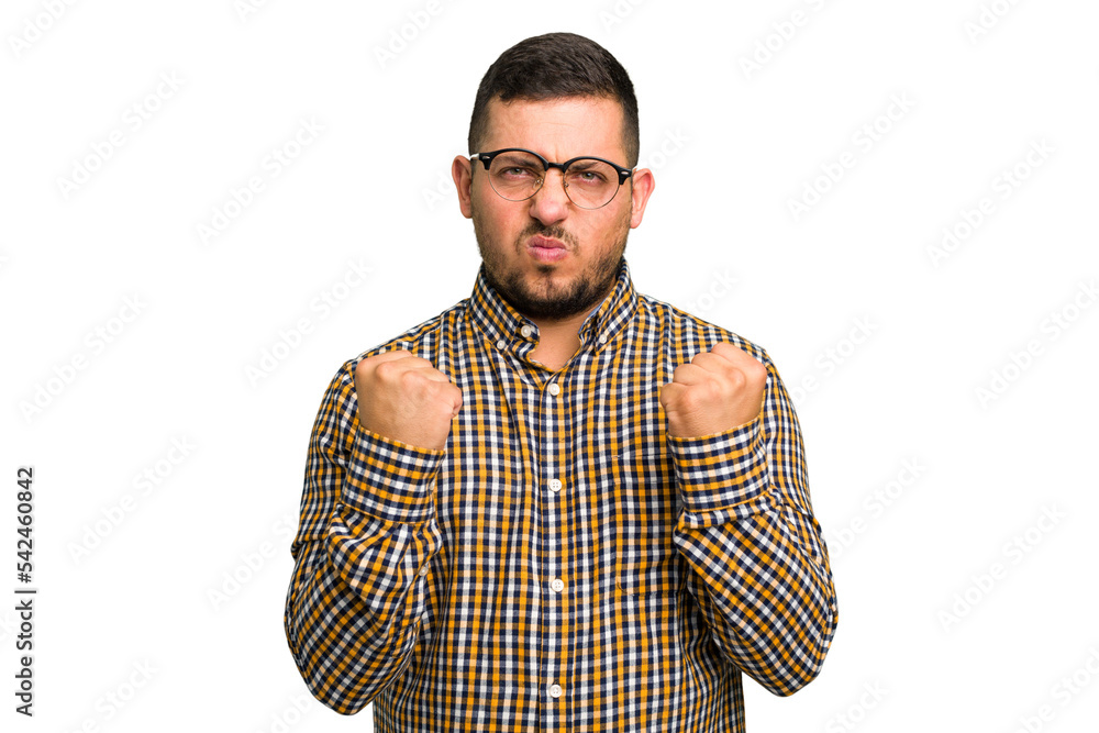 Young caucasian man isolated showing fist to camera, aggressive facial expression. Young caucasian man isolated showing fist to camera, aggressive facial expression.