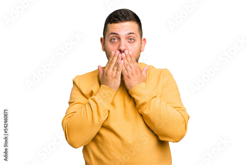 Young caucasian man isolated shocked, covering mouth with hands, anxious to discover something new.