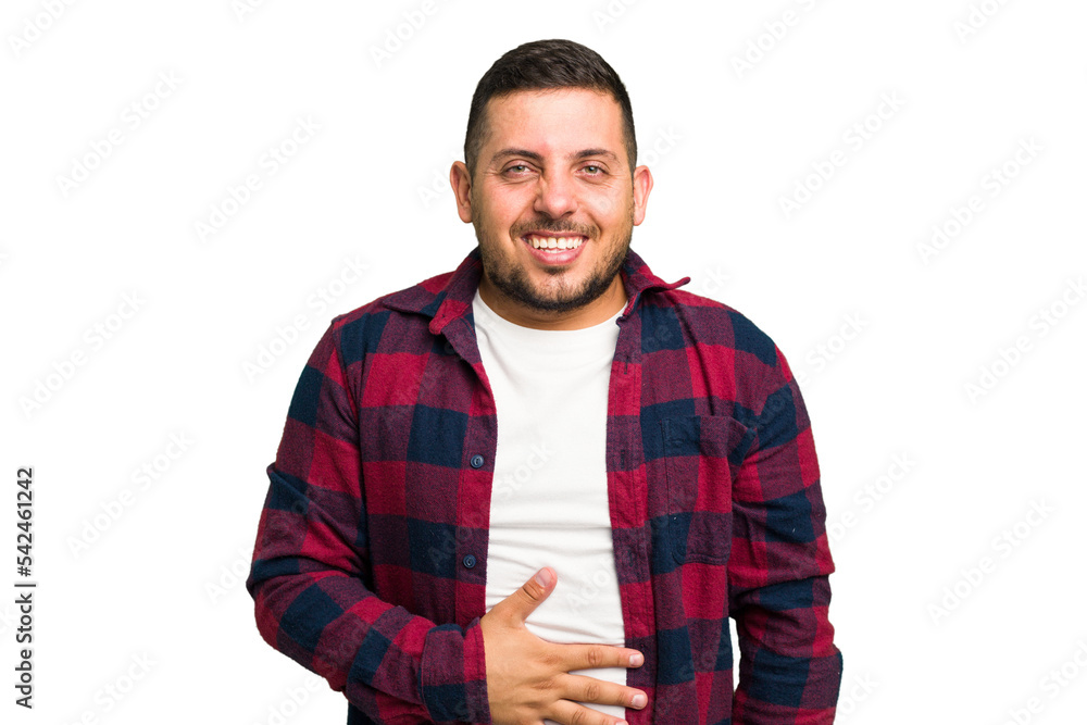 Young caucasian man isolated touches tummy, smiles gently, eating and satisfaction concept. Young caucasian man isolated touches tummy, smiles gently, eating and satisfaction concept.