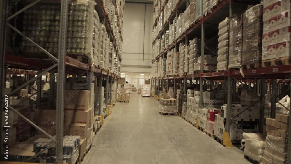 A new warehouse with racks for storing things and products in bags and boxes. Business, logistics. A new warehouse with racks for storing things and products in bags and boxes. Business, logistics.