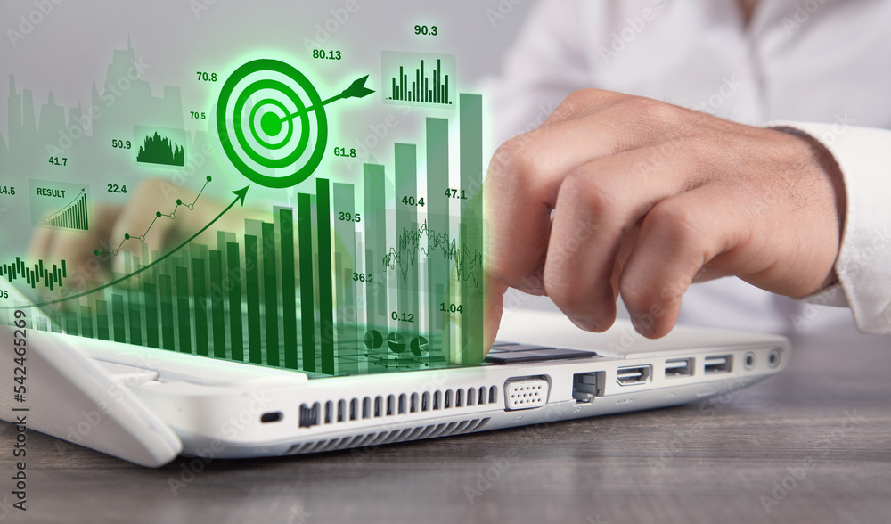 Human working at office. Achieve business goals with growth graphs. Goals. Business Human working at office. Achieve business goals with growth graphs. Goals. Business