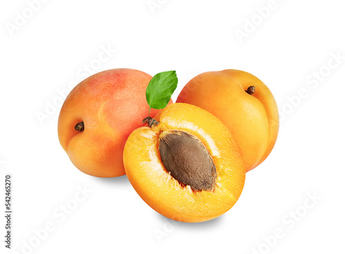 Apricots isolated on white or transparent background. Three apricot fruits whole and cut half with green leaves