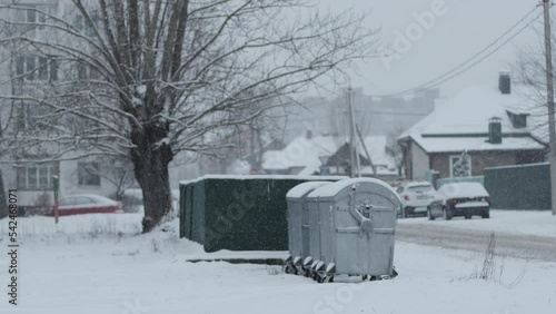 Wallpaper Mural New trash cans for sorting glass, paper and plastic are on the trash can in the courtyard of the house under a layer of snow in winter. Industry Torontodigital.ca