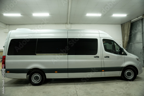 comfortable passenger bus interior with upholstered seats
