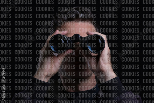 man with binoculars in a dark background