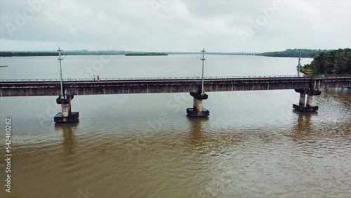 Aerial Footage of Train Bridge on Sea with Boat Sailing-Drone Video 4k video