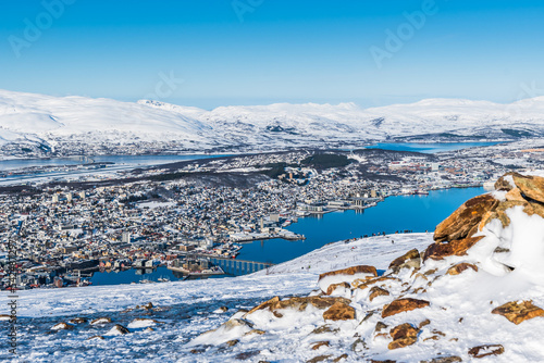 View from Mount Storsteinen on the Norwegian mountains around the city of Tromso