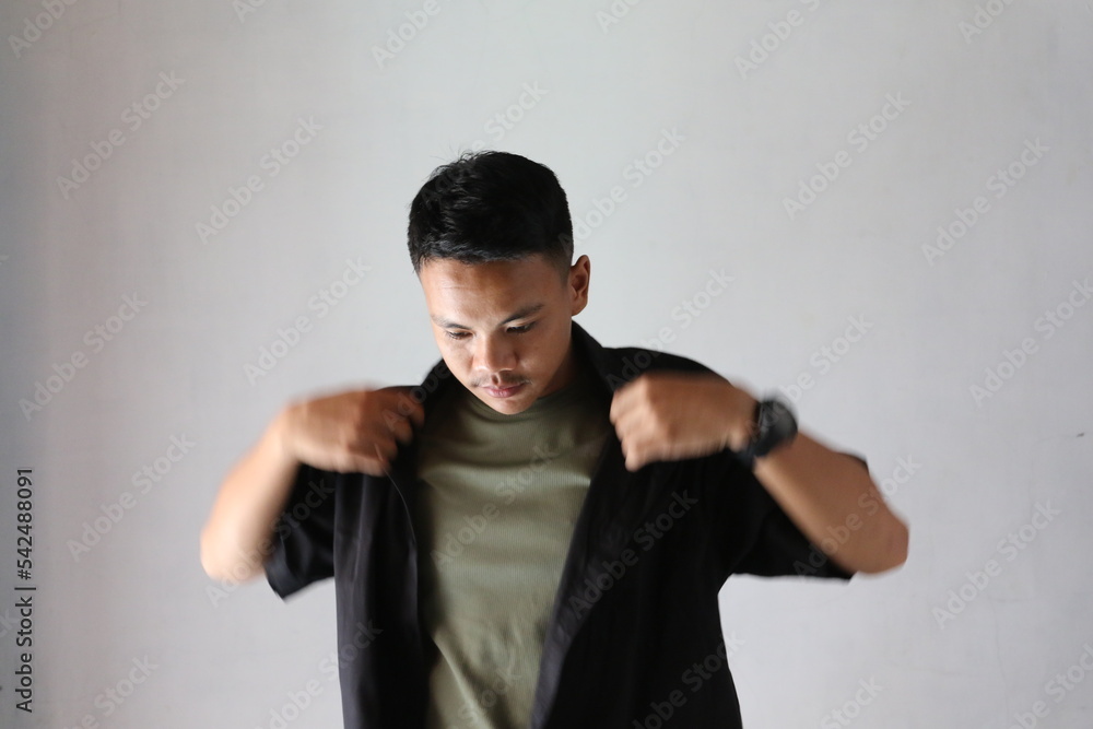 Asian man showing thinking expression isolated on white background Asian man showing thinking expression isolated on white background