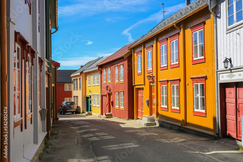 Street with colofful houses in Roeros, Norway photo