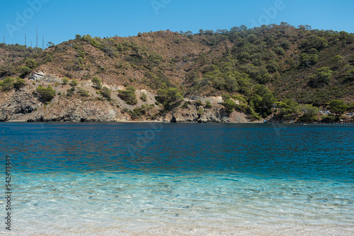 tropical beach with white sand and turquoise water travel tourism wide panorama background sea coast