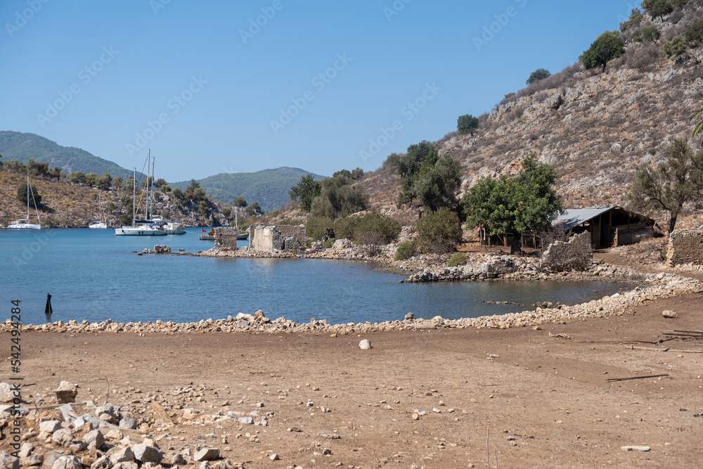 beautiful bay lagoon beach with turquoise water small touristic village travel tourism panorama background sea coast