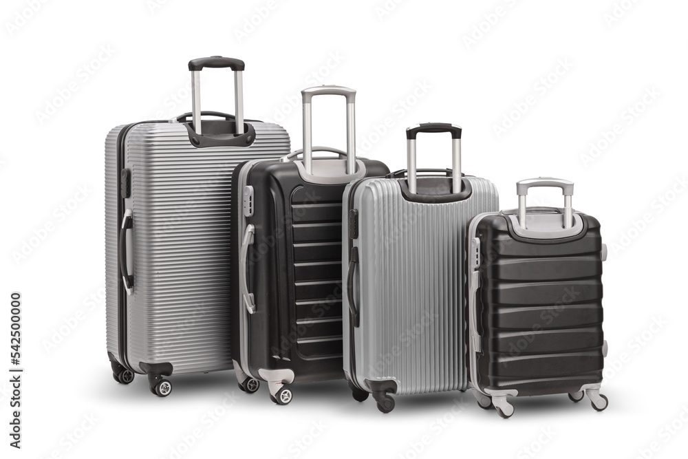 Studio shot of silver and black suitcases with wheels Studio shot of silver and black suitcases with wheels