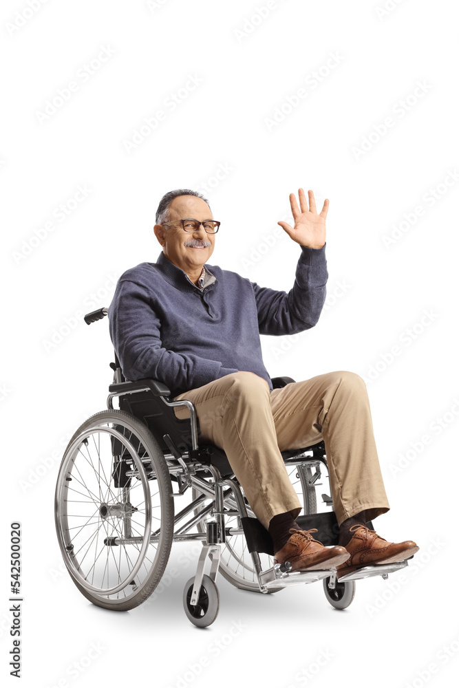 Mature man sitting in a wheelchair and waving Mature man sitting in a wheelchair and waving