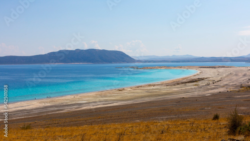 Salda Lake is a turquoise crater lake. Jezero Crater on Mars and Salda Lake in Burdur have similar geographical features and are known as Turkey's Maldives. photo