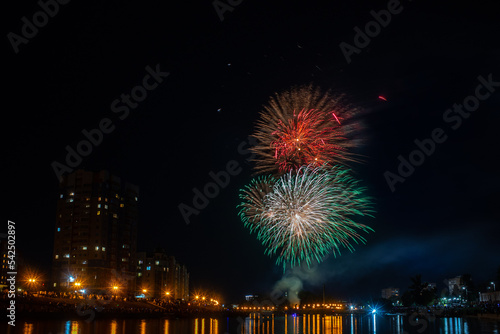 fireworks over the river in the city