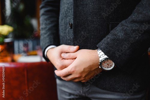 Man's watch on hand. Classic men's accessories and style.