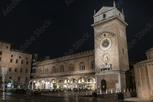 The Palazzo della Regione and the Clock Tower of Mantua illuminated at night