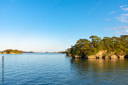 Matsushima Bay in dusk, beautiful islands covered with pine trees and rocks. One of the Three Views of Japan, and is also the site of the Zuigan-ji, Entsu-in and Kanrantei. in Miyagi Prefecture, Japan