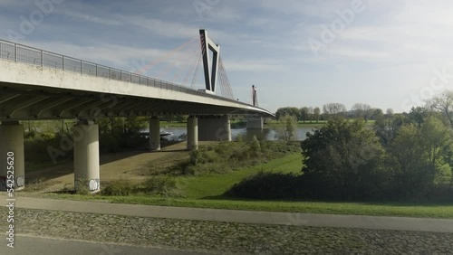 a wide shot of the airport bridge over the river rhine near the city of dusseldorf in germany
