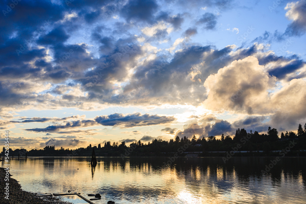 Sun beginning to set over river