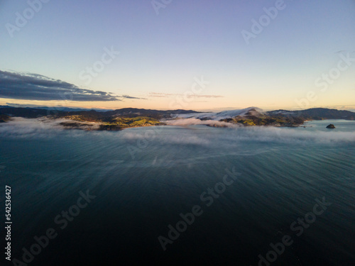 Drone shot of Sea level cloud inversion 