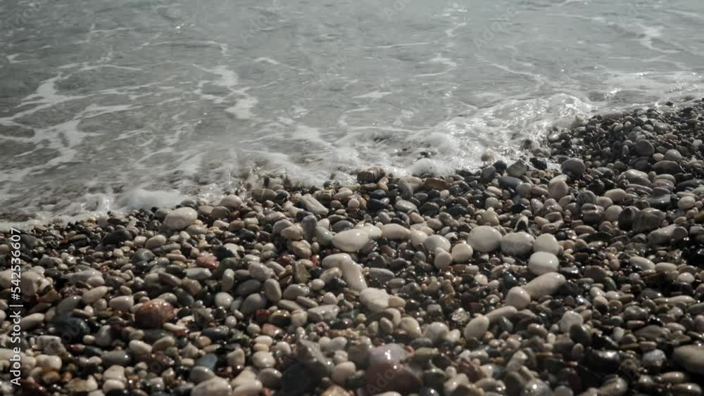 Laid out figure of a heart from white stones on a small-stony seashore. High quality 4k footage Laid out figure of a heart from white stones on a small-stony seashore. High quality 4k footage