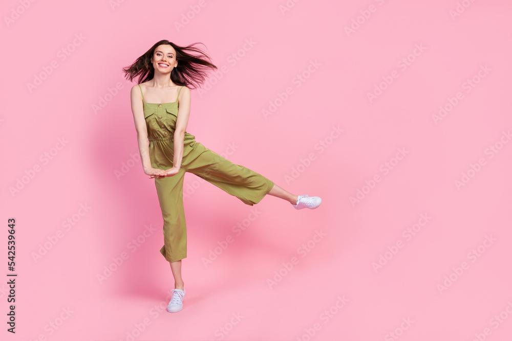 Full body photo of pretty cute lovely lady dancing empty space good mood free time isolated on pink color background Full body photo of pretty cute lovely lady dancing empty space good mood free time isolated on pink color background