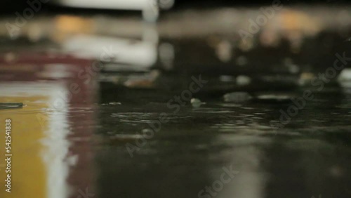 Water is dripping from ceiling to the floor. Water leaking from the ceiling in the warehouse