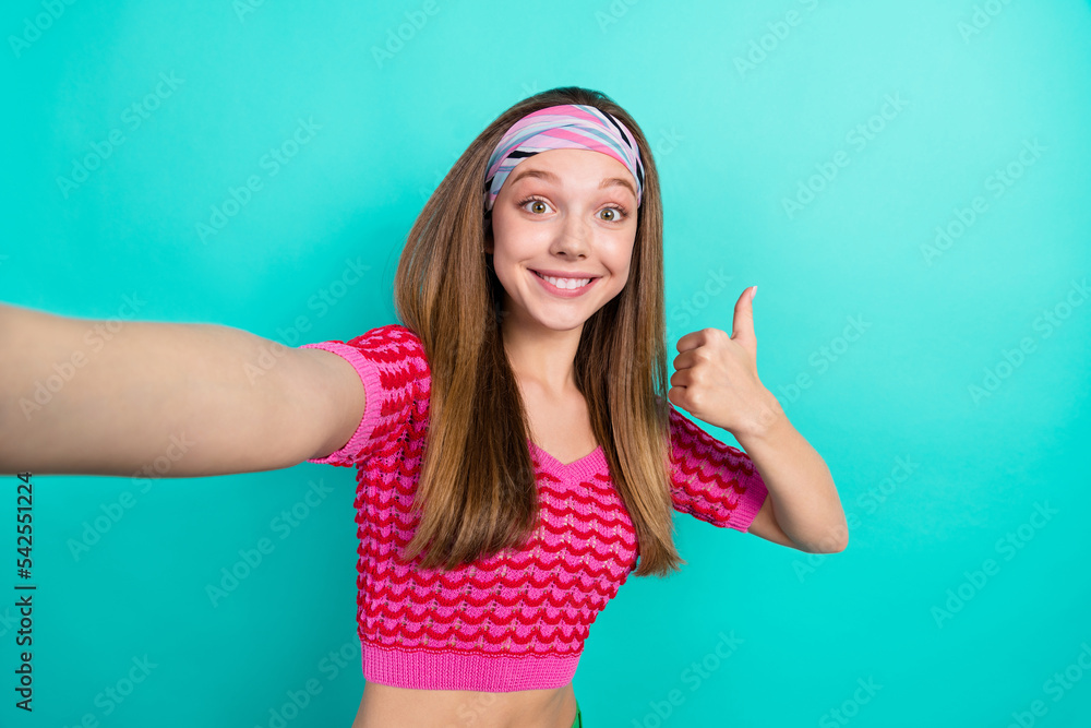 Photo of sweet funny school girl dressed pink crop top recording