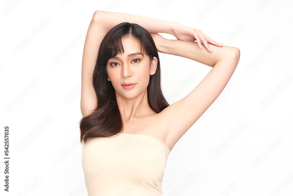 Beautiful Young Asian woman lifting hands up to show off clean and hygienic armpits or underarms on white background, Smooth armpit cleanliness and protection concept Beautiful Young Asian woman lifting hands up to show off clean and hygienic armpits or underarms on white background, Smooth armpit cleanliness and protection concept