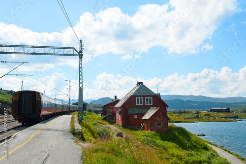 Train and the railway station in Finse on July 28 2019, Norway photo