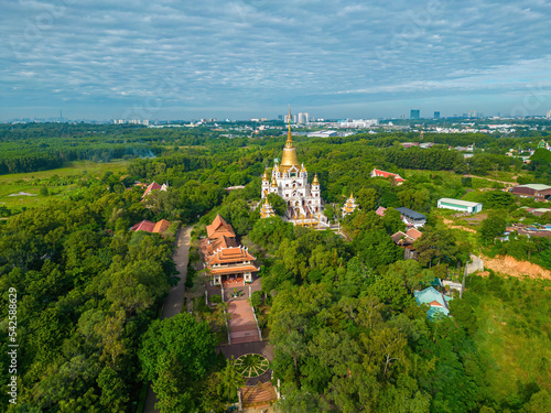 Aerial view of Buu Long Pagoda in Ho Chi Minh City. A beautiful buddhist temple hidden away in Ho Chi Minh City at Vietnam. A mixed architecture of India, Myanmar, Thailand, Laos, and Viet Nam photo