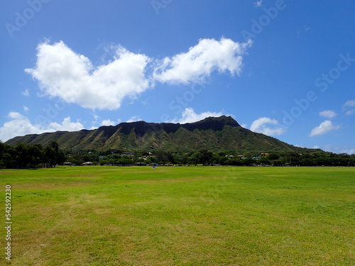 Kapiolani Park at during day with Diamond Head and clouds photo