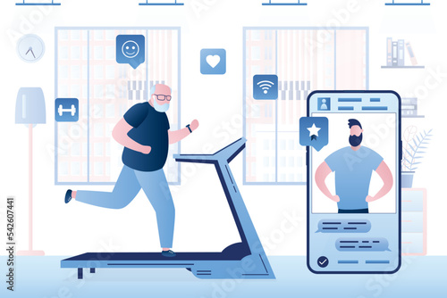 Elderly man run on treadmill. Indoor fitness, home gym. Technology of online fitness, mobile app with instructor on screen. Strong grandfather goes in for sports at home, room interior.