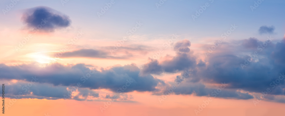 Fototapeta premium Panorama of Gentle pastel sunrise sundown sky background with colorful clouds