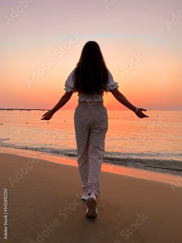 Beautiful woman enjoy amazing panorama. Travel landscape country Turkey in Alanya. Inspiring coast and Mediterranean Sea. Summer sunset time.