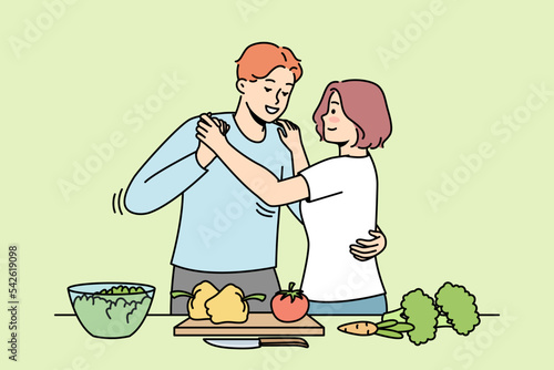 Happy couple cooking in kitchen dancing together. Smiling man and woman enjoy food preparation on weekend. Vector illustration. 