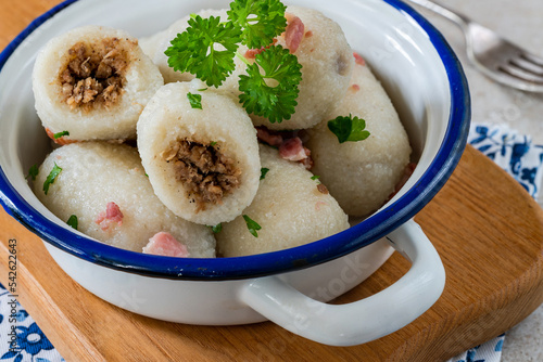 Pyzy - potato dumplings stuffed with meat, traditional Eastern European dish photo