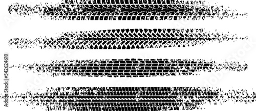 Black tire tread print with grunge effect set isolated on white background. Footprint of bike or car wheels with seamless texture. Top view of rubber protector marks on road. Vector brush.