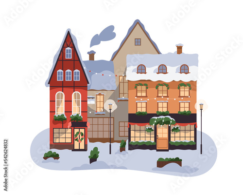 Buildings exterior in snow in European city at Christmas, winter holiday. Xma...