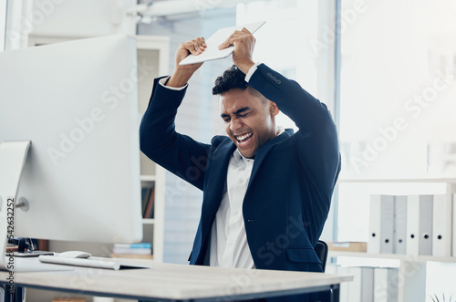 Angry, stress and businessman breaking technology in digital marketing office, advertising startup or company after 404 glitch. Mad, shouting or aggressive worker smashing tablet in rage from mistake