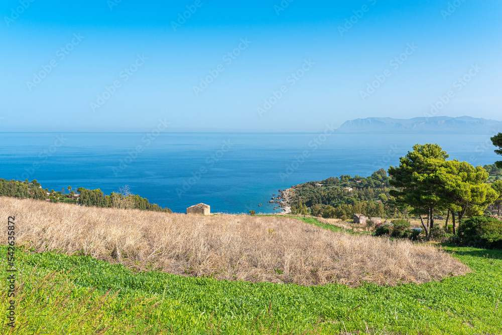 Landscape near the village Scopello in the north of Sicily. Fantastic view to the bay and beach named Cala Mazzo di Sciacca clos to the national Park Riserva dello Zingaro