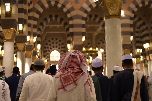 Crowd of Muslim people inside Nabawi Mosque. Interior view of Masjidil Nabawi (Nabawi Mosque) in Medina.