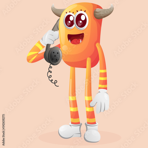 Cute orange monster pick up the phone, answering phone calls