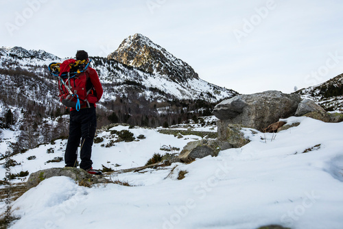 Young boy summit with snowshoes to Peiraforca Peak, Pyrenees, France