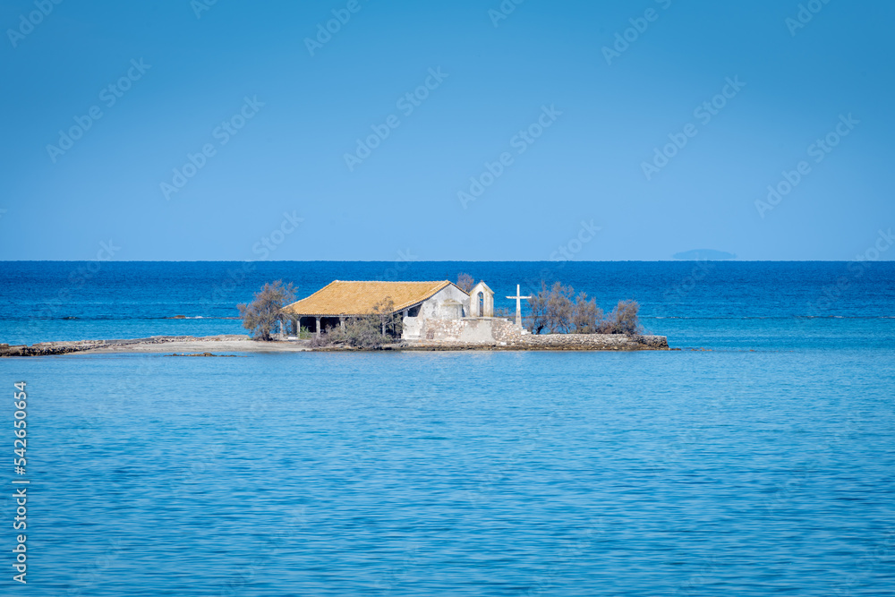A church built on a small patch of land on the sea. A church built on a small patch of land on the sea.