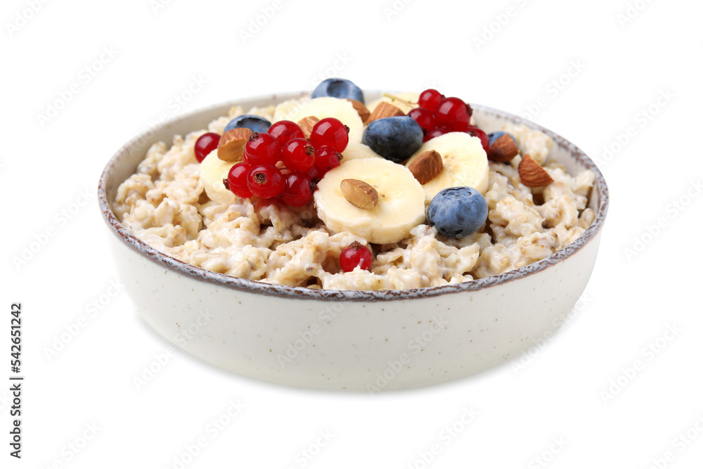 Ceramic bowl with oatmeal, berries and banana slices isolated on white Ceramic bowl with oatmeal, berries and banana slices isolated on white