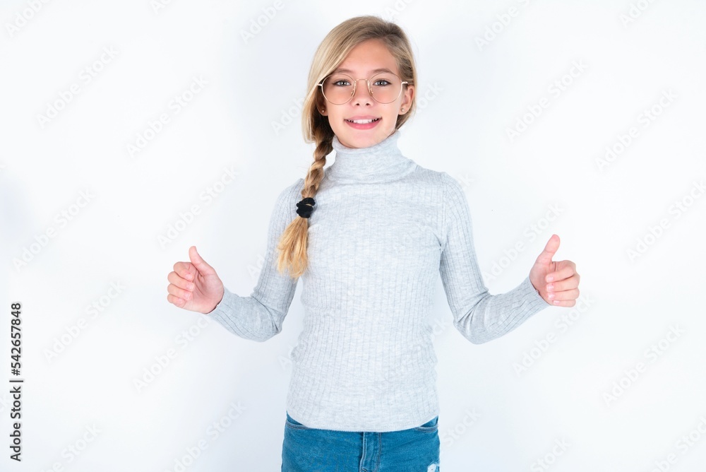 Happy beautiful caucasian teen girl wearing gray turtleneck sweater over white wall Holding Empty Paper Board Advertising Offer Text Standing. Autumn Advertisement Banner. Happy beautiful caucasian teen girl wearing gray turtleneck sweater over white wall Holding Empty Paper Board Advertising Offer Text Standing. Autumn Advertisement Banner.