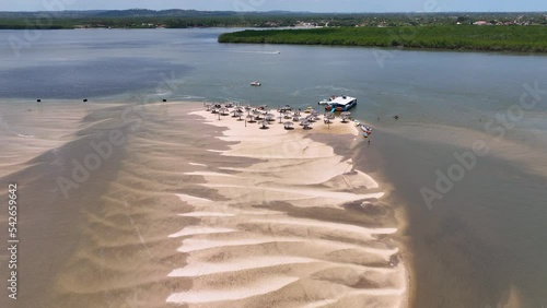 Famous Croa de Gore Island at Aracaju Brazil. Sergipe state at Northeast. Vacation destination. Tropical destination. Vacation Travel. Sand bank island at Aracaju Sergipe. Aracaju Brazil. photo