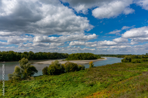 landscape of the Katun River floodplain on a sunny day with light clouds in the sky. Altay, Russia